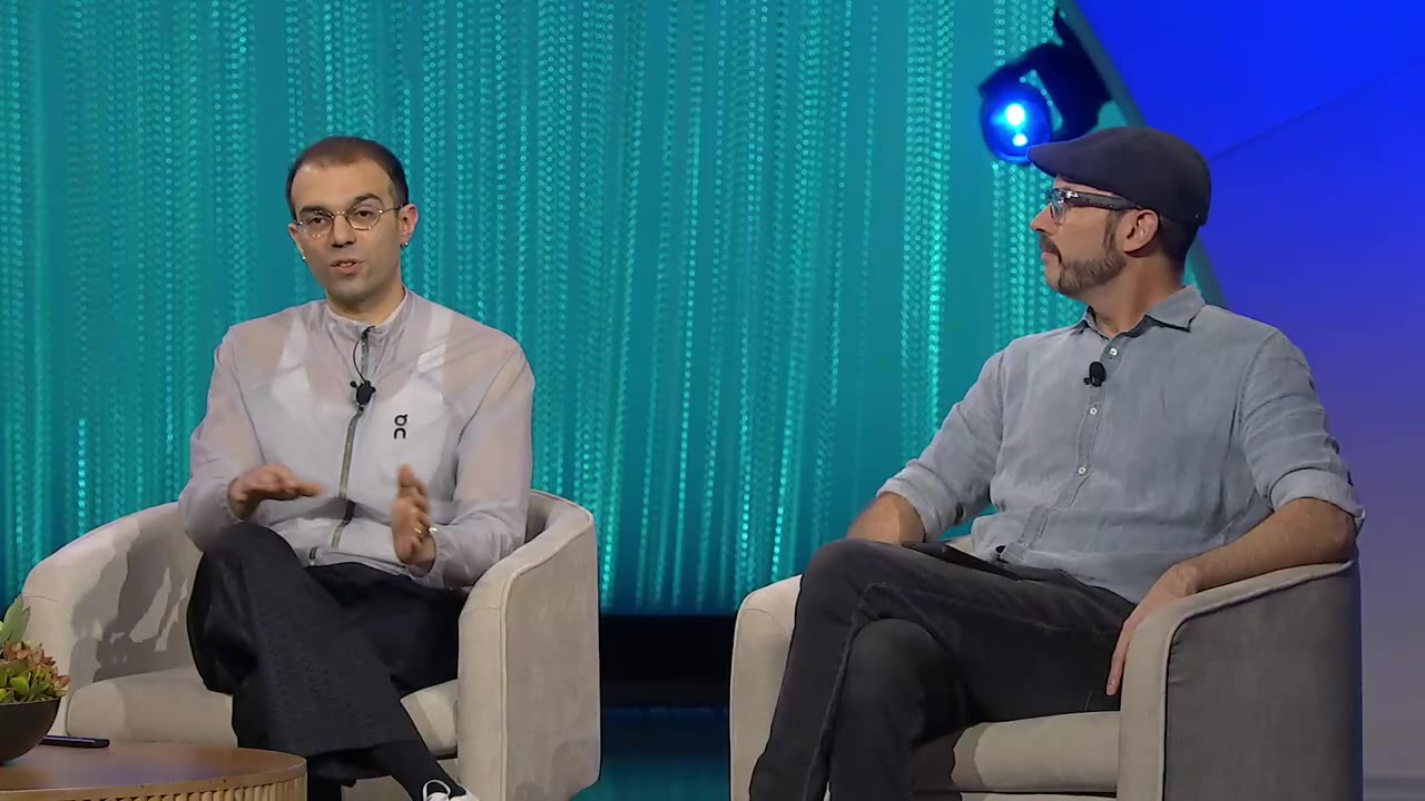 Don Haddad mid-answer with Martin listening beside him on the DTW 2025 panel stage